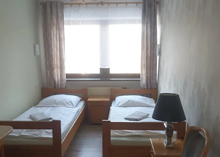 Uslugi Hotelarskie فندق